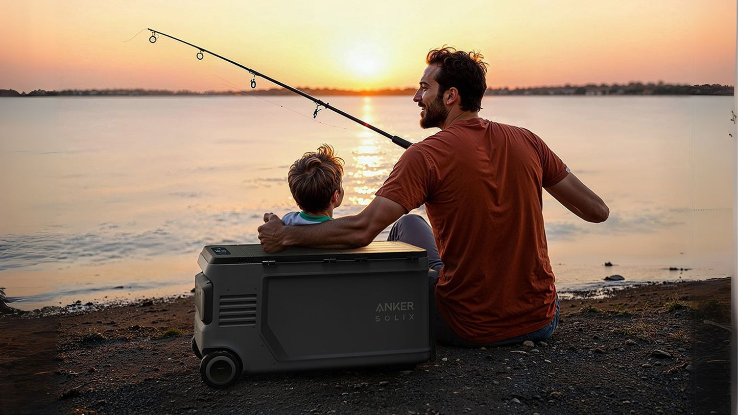 Anker SOLIX EverFrost 2 Electric Cooler 58L next to a man fishing on the beach
