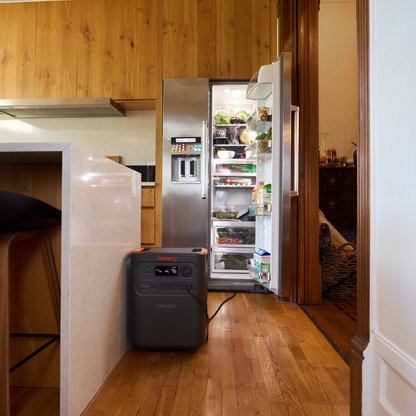 Jackery HomePower 3600 Plus Portable Power Station in a kitchen with an open refrigerator